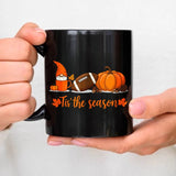 A black Egyptian temple designed ceramic cup with hieroglyphics and columns is suitable for drinking coffee, tea, or water at ho