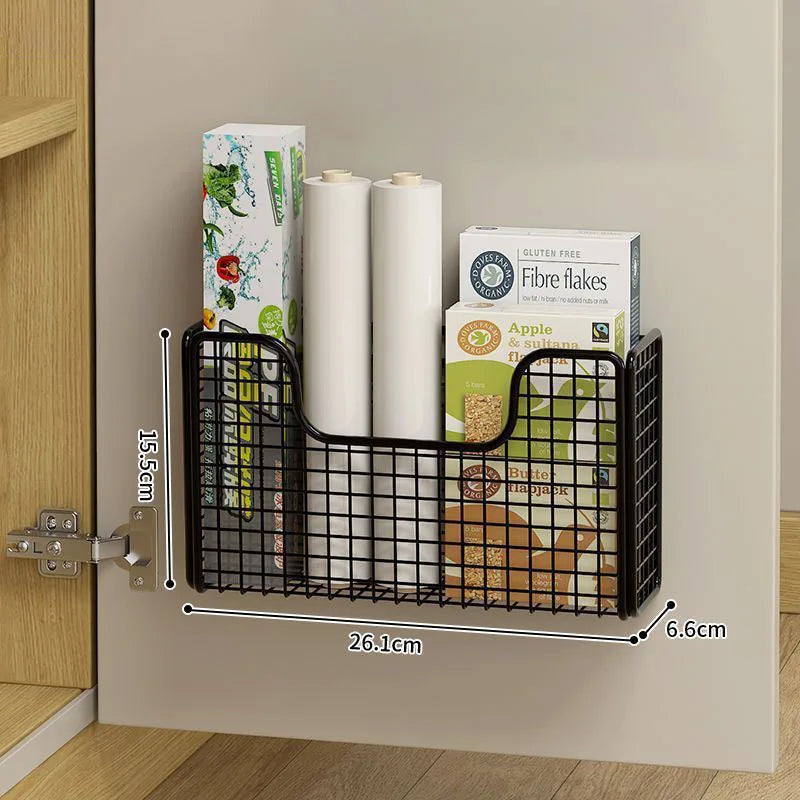 Storage box inside the kitchen cabinet door, storage bag on the hook behind the door, basket for the cabinet door