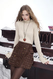 ELFSACK 2025 Winter New Arrivals Elegant Minimalist Classic Slim Fit Half High Neck Solid Gold Button Cuff Knit Sweater For Wome