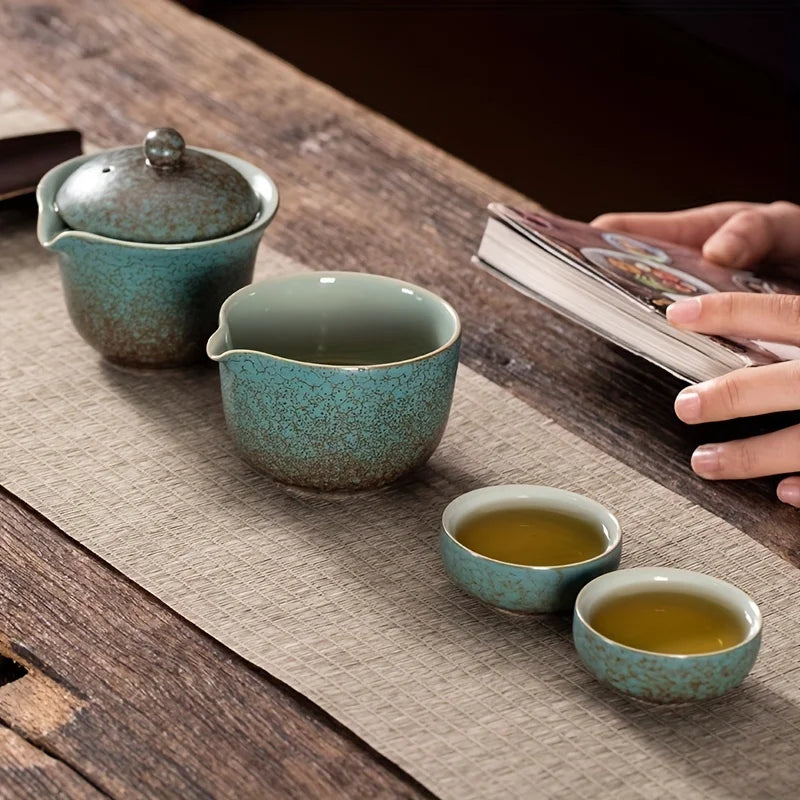 A set of exquisite ceramic tea ware, suitable for outdoor camping and home use, with a portable teapot.