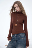 ELFSACK 2025 Winter New Arrivals Elegant Minimalist Classic Slim Fit Half High Neck Solid Gold Button Cuff Knit Sweater For Wome