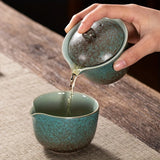 A set of exquisite ceramic tea ware, suitable for outdoor camping and home use, with a portable teapot.