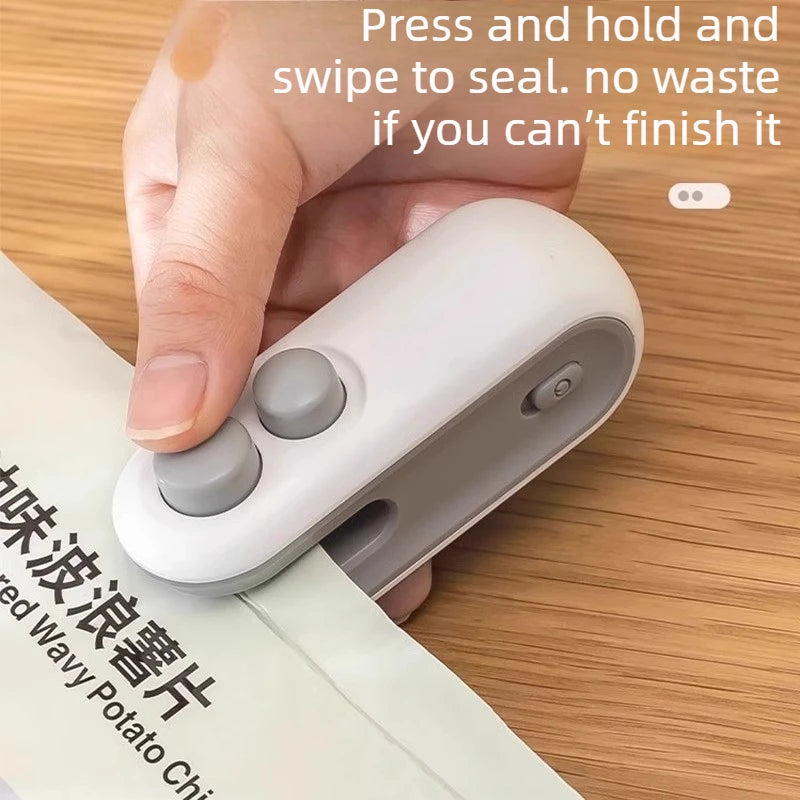 Sealing machine, small household hand press sealing device, mini portable snack moisture-proof plastic bag heat sealing machine