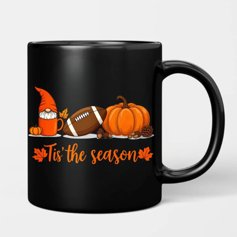 A black Egyptian temple designed ceramic cup with hieroglyphics and columns is suitable for drinking coffee, tea, or water at ho