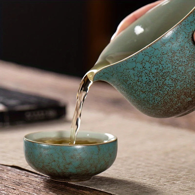 A set of exquisite ceramic tea ware, suitable for outdoor camping and home use, with a portable teapot.