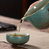 A set of exquisite ceramic tea ware, suitable for outdoor camping and home use, with a portable teapot.